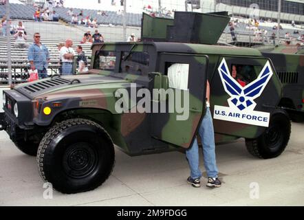 Members of the 436th Security Forces Squadron, Dover Air Force Base, Delaware, display their High-Mobility Multipurpose Wheeled Vehicles (HMMWV), which led the lead lap before the start of the MBNA 400 held at Dover Downs International Speedway, Delaware, on September 24, 2000. Base: Dover State: Delaware (DE) Country: United States Of America (USA) Stock Photo