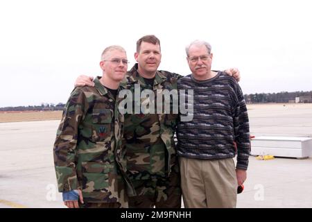 (from left to right) US Air Force AIRMAN First Class Nathan Castle, US Air Force CHIEF MASTER Sergeant Carey Castle and US Air Force Major (Ret) Allan Castle pause for a picture on the Shaw Air Force Base, South Carolina, flightline. A1C Castle is an F-16 Crewchief assigned to the 55th Fighter Squadron while his father, CMSGT Castle, is also a F-16 Crewchief assigned to the 20th Logistics Group. MAJ Allan Castle is a former USAF KC-135 Pilot that retired from service in 1971. A1C and CMSGT Castle had the opportunity to launch a jet together as a team while MAJ Castle and other family members l Stock Photo