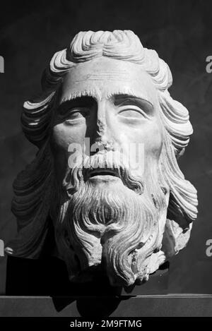 Black and white photo of head of Jesus sculpted in stone Stock Photo