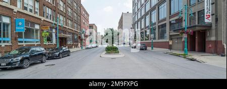 Cars parked along empty city street, Milwaukee, Wisconsin, USA Stock Photo