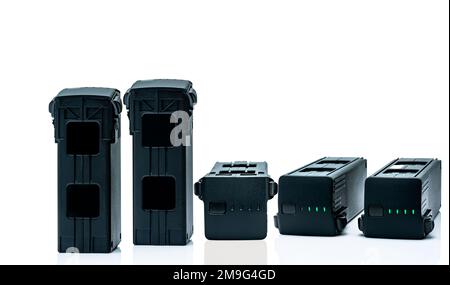 Drone LiPo battery on white background. Rechargeable battery of drone aircraft with digital camera. Lithium polymer battery used to power UAV. Lithium Stock Photo