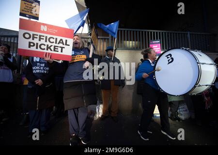 Striking nurses on a picket line outside the Royal Liverpool Hospital in the city centre of Liverpool. The nurses are members of the Royal College of Nursing, whose members are on strike today in England, Wales and Northern Ireland, as they demand a pay rise from their NHS employers. Around 250 nurses joined the action on three picket lines outside the hospital. Stock Photo