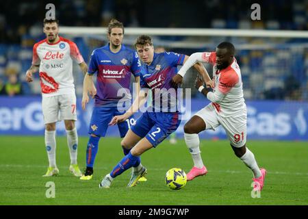 Cremonese Scottish defender Jack Hendry challenges for the ball with SSC Napoli French midfielder Tanguy Ndombele during the Italy cup football match between SSC Napoli and Cremonese at the Diego Armando Maradona Stadium in Naples, southern Italy, on January 17, 2023. Stock Photo