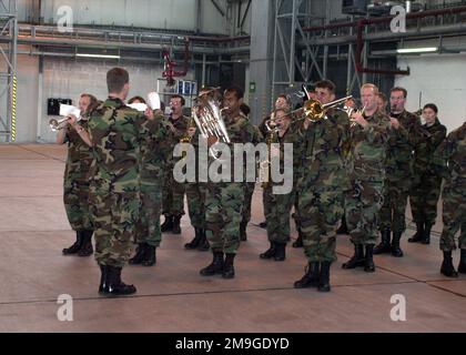 Members of the US Air Forces Europe band perform for the crowd prior to General Michael Ryan, Air Force CHIEF of STAFF arrival for an all hands call in hangar three at Ramstein Air Base, Germany, during his final visit to Ramstein on 26 Jul 01. Base: Ramstein Air Base State: Rheinland-Pfalz Country: Deutschland / Germany (DEU) Scene Major Command Shown: USAFE Stock Photo