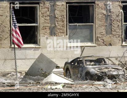 A US flag set outside the Pentagon after a hijacked American Airlines Flight 77, a Boeing 757-200 was deliberately crashed into it on September 11, 2001. The Pentagon attack followed an attack on the twin towers of the New York World Trade Center, where two fully loaded passenger airliners were flown into the buildings, in what is called the worst terrorist attack in history. Base: Pentagon State: District Of Columbia (DC) Country: United States Of America (USA) Stock Photo