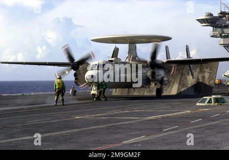 An E-2C Hawkeye aircraft assigned to Carrier Airborne Early Warning Squadron Seven Eight (VAW-78) prepares to launch from catapult one during flight operations aboard USS NIMITZ (CVN 68) while en route to San Diego, California. Base: USS Nimitz (CVN 68) Stock Photo