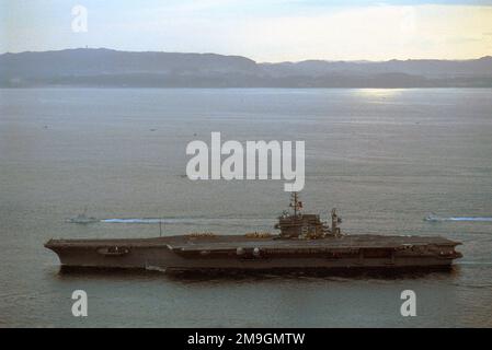 A port side view of the Aircraft Carrier USS KITTY HAWK (CV