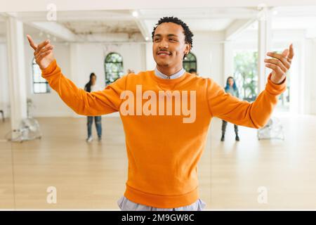 Image of biracial male hip hop trainer during dance training Stock Photo