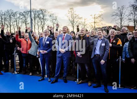 HARDERBERG - King Willem-Alexander takes a picture with volunteers during the official opening of the multifunctional accommodation (MFA) De Beuk in De Krim, municipality of Hardenberg. Fourteen years ago, the inhabitants of De Krim came up with the plan to build this MFA in order to preserve the quality of life in the village for the future and to bind young people. ANP SEM VAN DER WAL netherlands out - belgium out Stock Photo