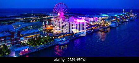 Aerial view of Navy Pier with Ferris wheel at night, Chicago, Illinois, USA Stock Photo