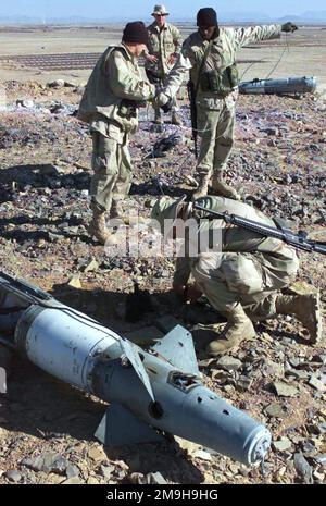 STAFF Sergeant William A. Scott, USMC, with the Explosive Ordnance ...