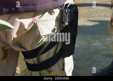 A view of a hip holster for the M-9 Beretta service pistol preferred by some Marines with Kilo Company, Battalion Landing Team 3/6, 26th Marine Expeditionary Unit (Special Operations Capable) (MEU(SOC)) at the Kandahar International Airport, Kandahar, Afghanistan, during OPERATION ENDURING FREEDOM. Subject Operation/Series: ENDURING FREEDOM Base: Kandahar International Airport Country: Afghanistan (AFG) Scene Major Command Shown: 26 MEU Stock Photo