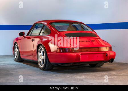 Rear view of red 1992 Porsche Carrera 911 RS 3.6-Litre Flat-Six sports car Stock Photo