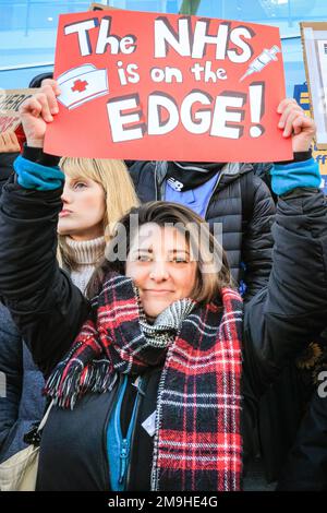 London, UK. 18th Jan, 2023. Nurses, medical staff, RNC union members and their supporters shout and protest with placards and banners. A well attended march and rally in support of striking NHS nurses sets of from UCLH and travels through central London to Downing Street in Westminster. Credit: Imageplotter/Alamy Live News Stock Photo