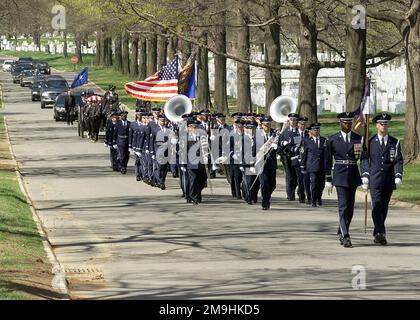 The US Air Force (USAF) Honor Guard and the USAF Band escort the remains of US Air Force (USAF) Major General (MGEN) Howard W. Cannon (RET), carried by the US Armys (USA) Old Guard Platoon to the Arlington National Cemetery, where he will be buried with full military honors. MGEN Cannon was a former senator to the state of Nevada. Base: Arlington National Cemetery State: Virginia (VA) Country: United States Of America (USA) Stock Photo