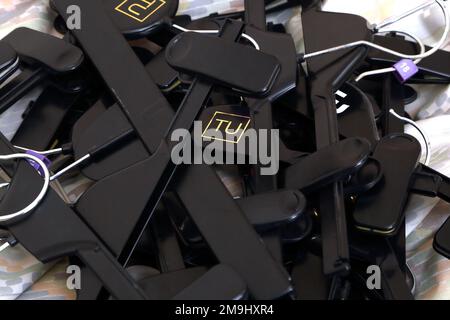 A Bundle of Plastic Clipped Clothes Hangers Stock Photo