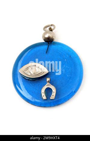 Evil Eye Charm with Horseshoe on Protection against Bad Luck Stock Photo