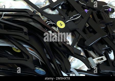 A Bundle of Plastic Clothes Hangers Stock Photo