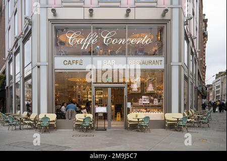 Caffè Concerto Covent Garden, an Italian cafe and restaurant on St Martin's Courtyard, Long Acre, Covent Garden, London, England, UK Stock Photo