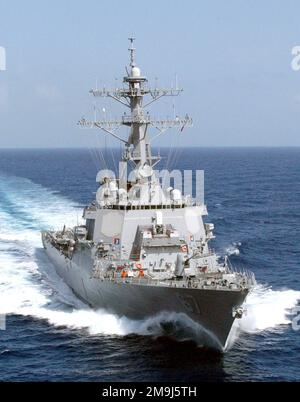 Starboard bow view of the US Navy (USN) ARLEIGH BURKE CLASS (FLIGHT I) GUIDED MISSILE DESTROYER (AEGIS), USS COLE (DDG 67), underway off the coast of Puerto Rico conducting Combat System Ship Qualification Trials with Naval Sea System Command (NAVSEA). Country: Unknown Stock Photo