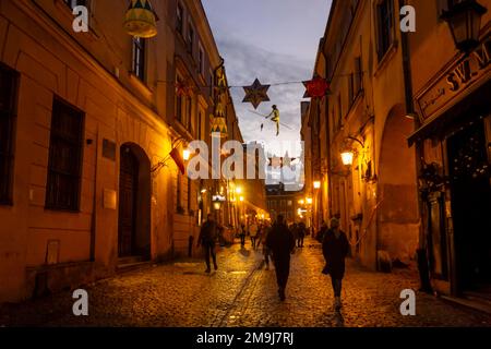 Lublin, Lublin Voivodeship, Poland, 26.12.2023. Old town of Lublin during the New Year holidays, late evening Stock Photo