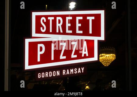 Sign for Gordon Ramsay's Street Pizza restaurant at night.  Paradise Street, Liverpool. Stock Photo