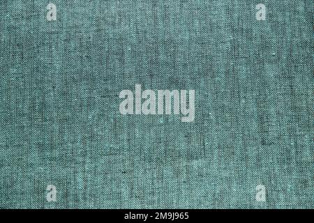 Turquoise green linen fabric texture closeup as textile background Stock Photo