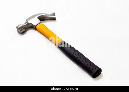 black and yellow hammer on white background Stock Photo
