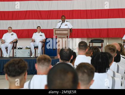 220519-N-UJ449-1142 NAVAL AIR STATION SIGONELLA, Italy (May 19, 2022)— Cmdr. Brandon Woods, outgoing Patrol Squadron (VP) 9 commanding officer, gives a speech during a change of command ceremony on Naval Air Station Sigonella, May 19, 2022. NAS Sigonella’s strategic location enables U.S., allied, and partner nation forces to deploy and respond as required, ensuring security and stability in Europe, Africa and Central Command. Stock Photo