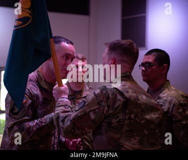 U.S. Army Lt. Col. Michael Dryer, 1st Space Battalion commander, takes the guidon as Cpt. Jordan Dea, 22nd Space Company Joint Tactical Ground Station (JTAGS) 1st Space Battalion outgoing commander, relinquishes command during a change of command ceremony at Misawa Air Base, Japan, May 19, 2022. JTAGS primary mission is to provide in theater ballistic missile early warning. This is achieved by manning and operating forward-based JTAGS units in Italy, Qatar, Korea and Japan. Stock Photo