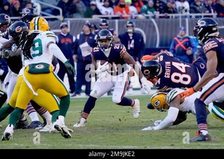 Chicago Bears running back Darrynton Evans (21) carries the ball against  the New York Jets during an NFL football game, Sunday, Nov. 27, 2022, in  East Rutherford, N.J. (AP Photo/Seth Wenig Stock