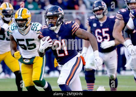 Chicago Bears running back Darrynton Evans (21) carries the ball against  the New York Jets during an NFL football game, Sunday, Nov. 27, 2022, in  East Rutherford, N.J. (AP Photo/Seth Wenig Stock