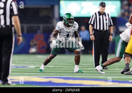 Oxford, MS, USA. 18th Sep, 2021. Ole' Miss running back Jerrion Ealy (9)  slips the tackle of Tulane linebacker Nick Anderson (1), defense during the  NCAA football game between the Tulane Green