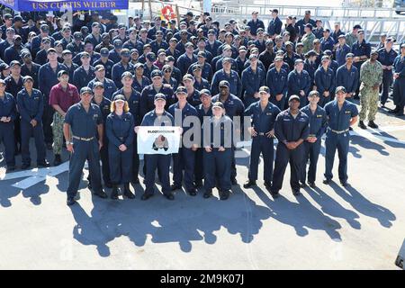 SAN DIEGO, CA (May 19, 2022) - The crew of USS Curtis Wilbur (DDG 54) receives the Bloodhound Award for Anti-Surface Warfare (ASW) excellence for the year 2021, this is their third award in the last six years. Stock Photo