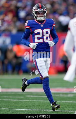 LANDOVER, MD - DECEMBER 18: New York Giants defensive back Cor'Dale Flott  (28) peeks into the backfield during the New York Giants game versus the  Washington Commanders on December 18, 2022, at