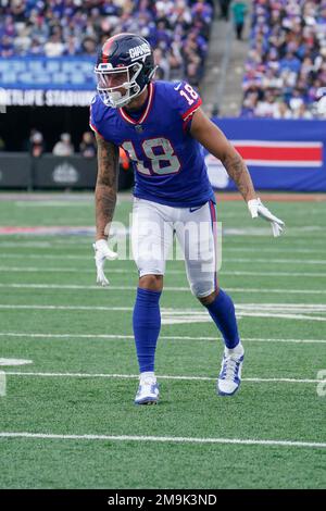 New York Giants' Isaiah Hodgins catches a pass between Minnesota Vikings'  Chandon Sullivan and Duke Shelley during the first half of an NFL wild card  football game Sunday, Jan. 15, 2023, in