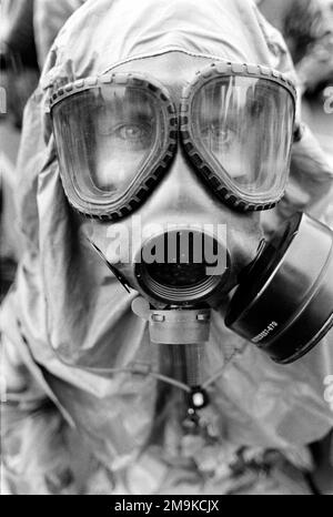 A US Marine Corps Reserve (USMCR) Marine assigned to A/Company, 4th Light Armored Reconnaissance Battalion (LAR), poses for a photograph wearing Mission-Oriented Protective Posture response level 4 (MOPP-4) gear at Camp Pendleton, California (CA), in preparation for mobilization in support of Operation ENDURING FREEDOM. Base: Marine Corps Base Camp Pendleton State: California (CA) Country: United States Of America (USA) Stock Photo