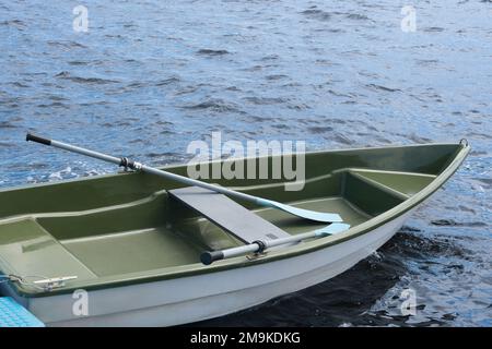 Plastic boat on water, close-up Stock Photo