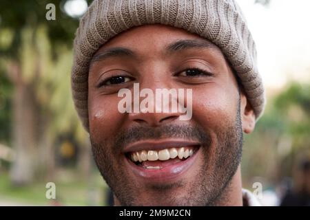 Portrait of multiracial man smiling and looking at camera. Stock Photo