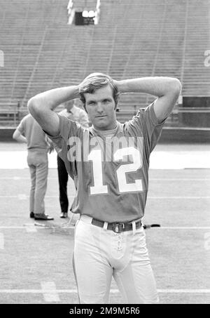 Coach of the Miami Dolphins' perfect season, Don Shula, with quarterback  Bob Griese during a halftime ceremony celebrating the undefeated 1972 team  as the Dolphins play host to the Cincinnati Bengals on