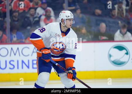 Philadelphia Flyers' Nicolas Deslauriers, left, and New York Islanders'  Alexander Romanov collide during the first period