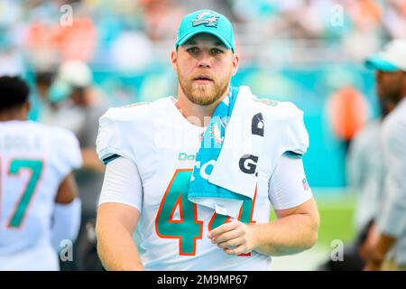 Miami Dolphins long snapper Blake Ferguson (44) stands on the field before  an NFL football game against the New England Patriots, Sunday, Jan. 9, 2022,  in Miami Gardens, Fla. (AP Photo/Doug Murray