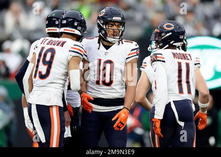 Chicago Bears wide receiver Chase Claypool (10) is tackled by Green Bay  Packers cornerback Rasul Douglas (29) during the first half of an NFL  football game, Sunday, Dec. 4, 2022, in Chicago. (