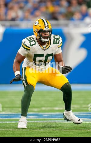 Green Bay Packers guard Zach Tom (50) runs on the field during the first  half of