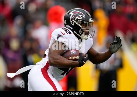 Atlanta Falcons running back Caleb Huntley (42) runs against the San  Francisco 49ers during the first half of an NFL football game, Sunday, Oct.  16, 2022, in Atlanta. (AP Photo/John Bazemore Stock