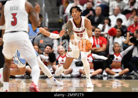 Louisville forward JJ Traynor (12) brings the ball up court against Boston  College during the second half of an NCAA college basketball game at the  Atlantic Coast Conference Tournament in Greensboro, N.C.