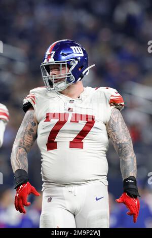 New York Giants guard Jack Anderson (77) walks off the field after an NFL  football game against the Houston Texans on Sunday, Nov. 13, 2022, in East  Rutherford, N.J. (AP Photo/Adam Hunger