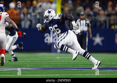 Dallas Cowboys defensive tackle Neville Gallimore (96) celebrates with fans  after an NFL football game against the New York Giants, Sunday, Dec. 19,  2021, in East Rutherford, N.J. The Dallas Cowboys defeated