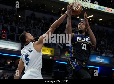 Orlando Magic's Franz Wagner goes up for a dunk against Indiana Pacers'  Myles Turner (33) during