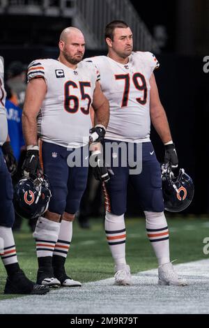 Green Bay, Wisconsin, USA. 18th Sep, 2022. Chicago Bears running back David  Montgomery (32) running through a hole made by center Cody Whitehair (65),  offensive tackle Larry Borom (75), and tight end